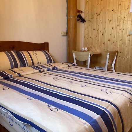 Machigo Apartment Beigan Bagian luar foto