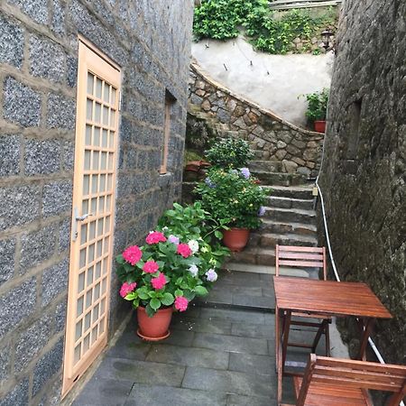 Machigo Apartment Beigan Bagian luar foto