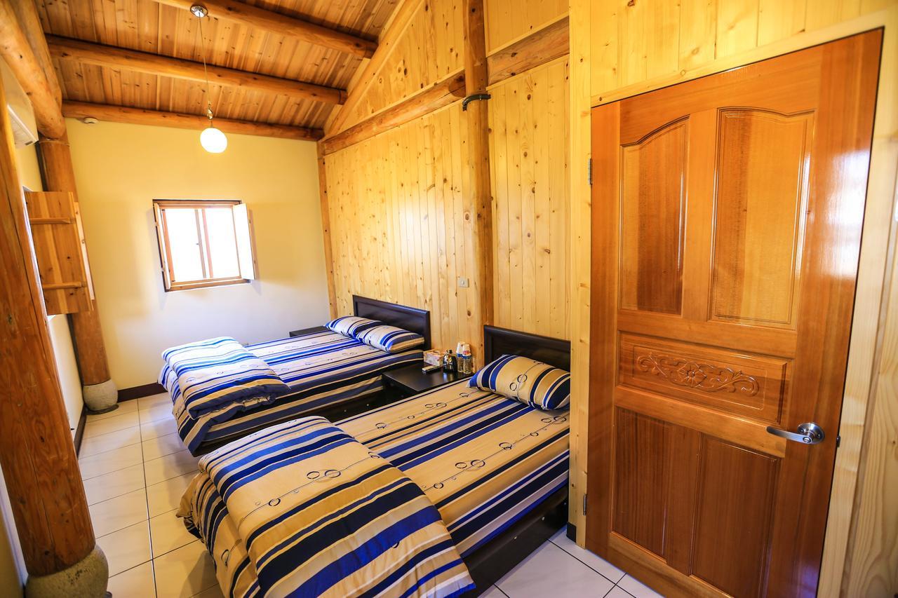 Machigo Apartment Beigan Bagian luar foto