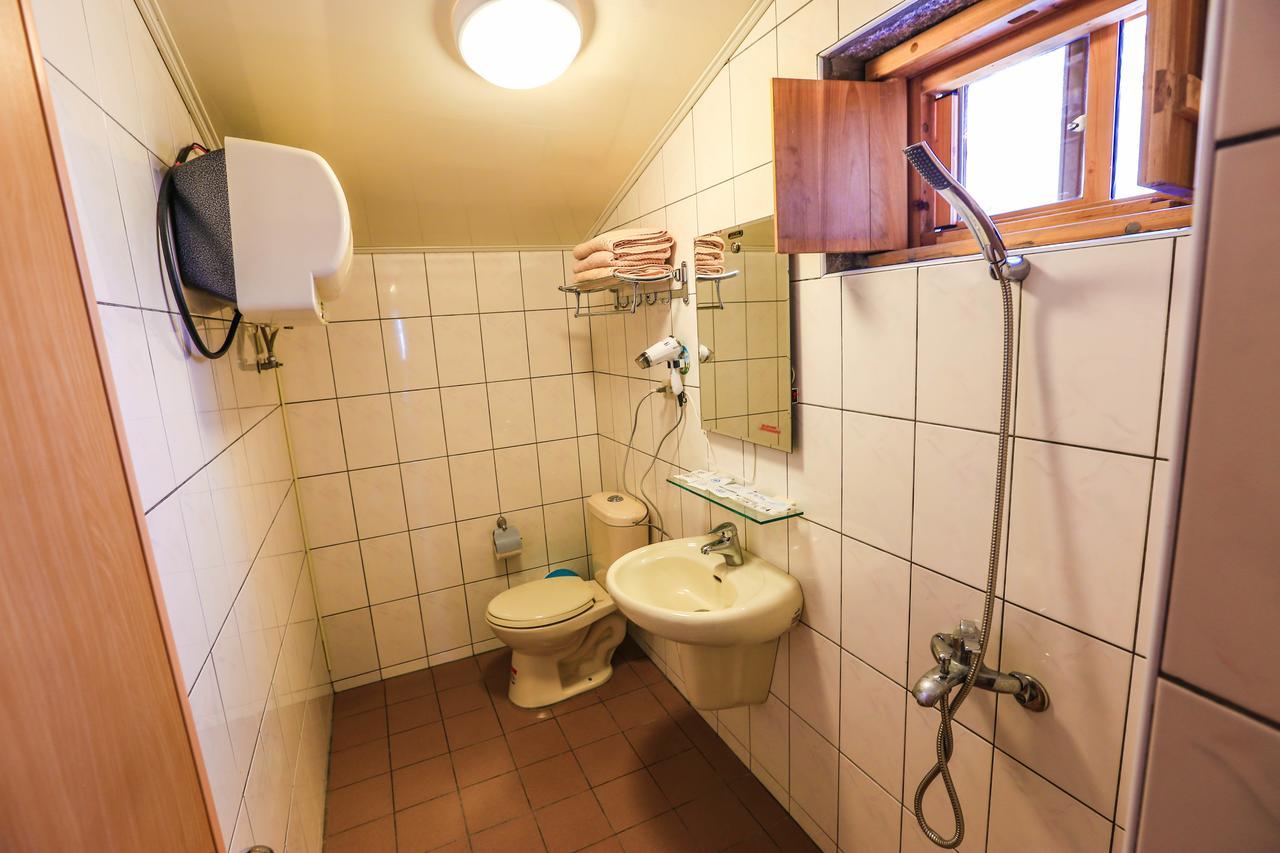Machigo Apartment Beigan Bagian luar foto