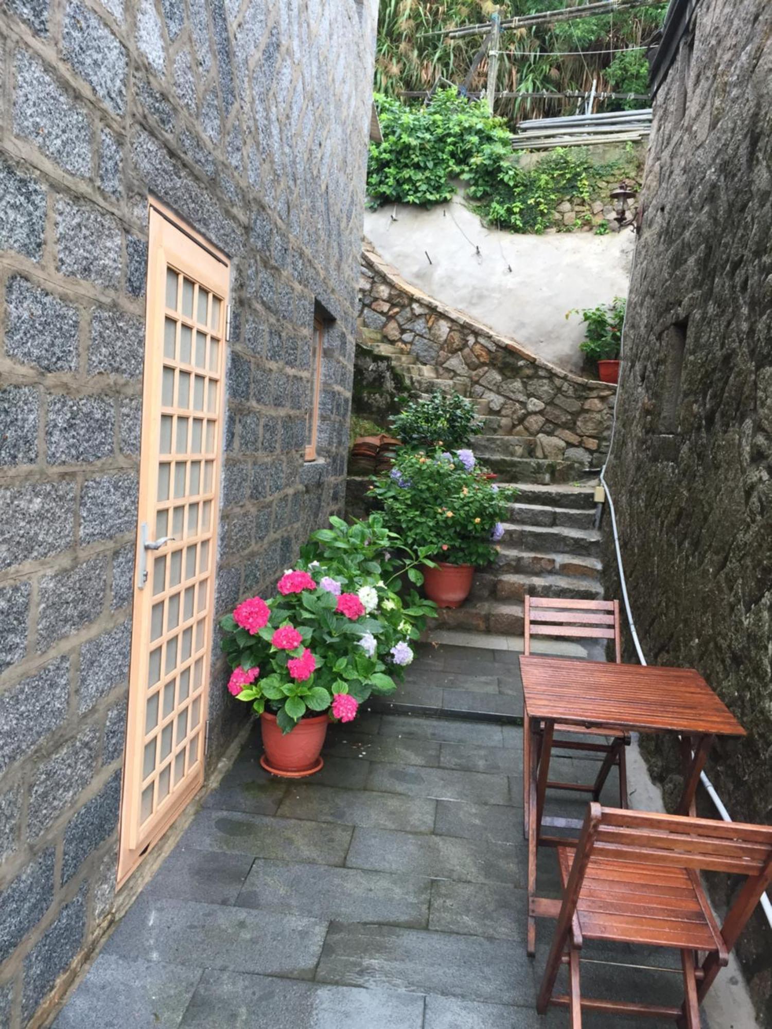 Machigo Apartment Beigan Bagian luar foto